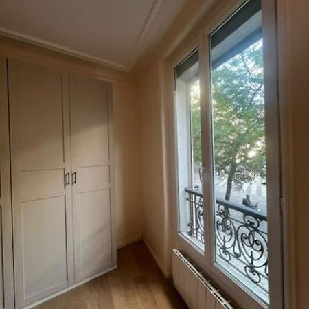 Charmant Appartement Alesia Parigi Esterno foto