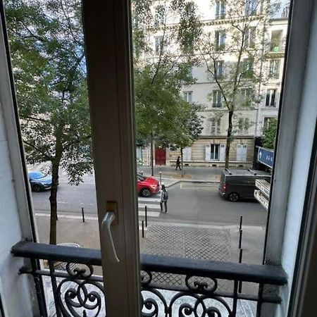 Charmant Appartement Alesia Parigi Esterno foto