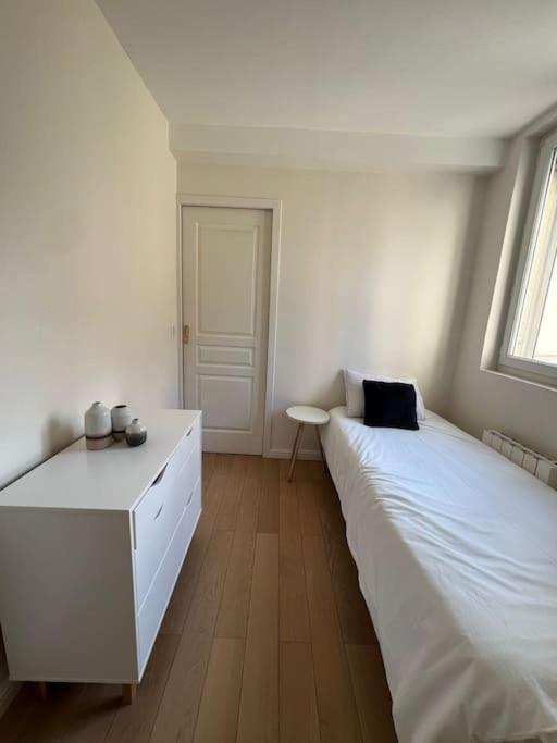 Charmant Appartement Alesia Parigi Esterno foto
