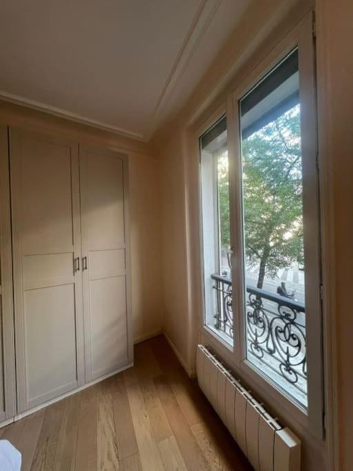 Charmant Appartement Alesia Parigi Esterno foto